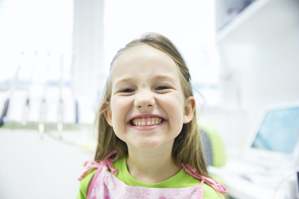 Many assume the first visit to a pediatric dentist should start when children have all their teeth. This assumption can lead to dental issues.
